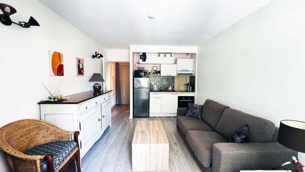 Appartement proche plage et commerces avec garage véranda et jardinet