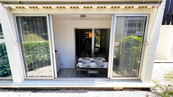 Appartement proche plage et commerces avec garage véranda et jardinet