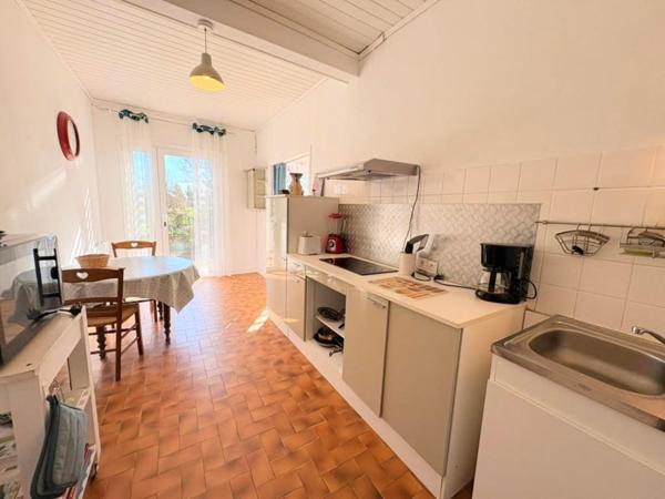 Maison de caractère 213 m2, studio, terrain 4000 m2, dépendances, avec vue dominante, caractère et potentiel