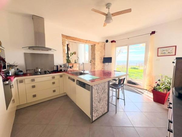 Maison de caractère 213 m2, studio, terrain 4000 m2, dépendances, avec vue dominante, caractère et potentiel