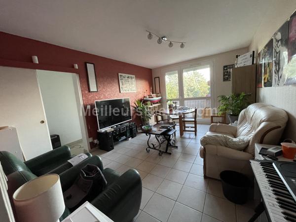 Appartement 2 chambres avec balcon, cave et garage