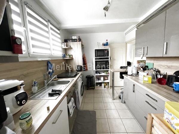 Appartement 2 chambres avec balcon, cave et garage