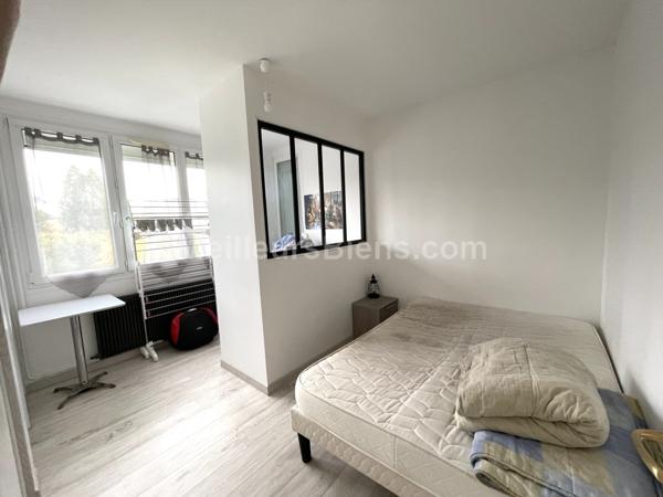 Appartement 2 chambres avec balcon, cave et garage