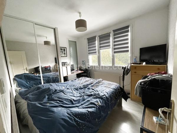 Appartement 2 chambres avec balcon, cave et garage