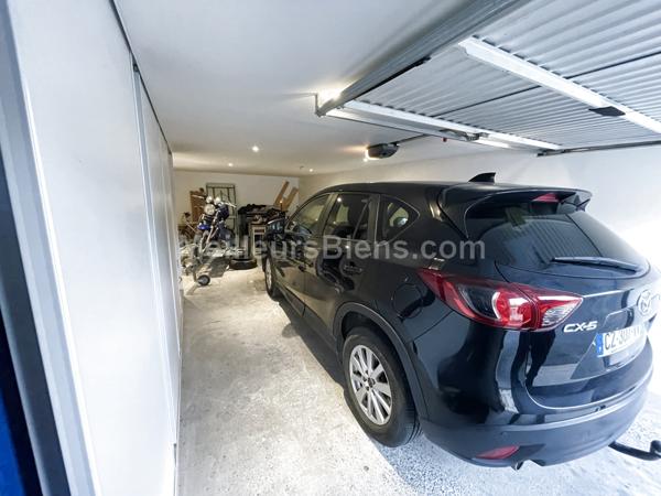 Appartement 2 chambres avec balcon, cave et garage