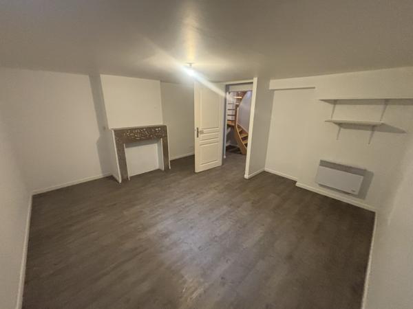 Malo: Appartement de charme en souplex avec cour et jardinet.