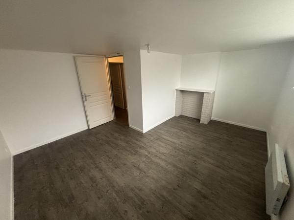 Malo: Appartement de charme en souplex avec cour et jardinet.