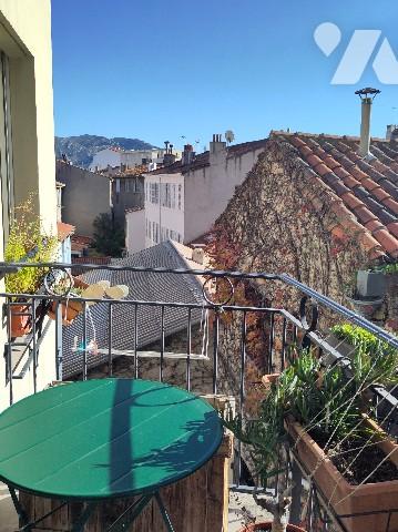 Rue Roger Brun, appartement traversant T5 de 103 m² avec terrasse de 8 m² et garage en sous-sol.