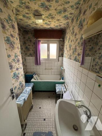 Maison 3 pièces (environ 60 m² habitables) située dans un secteur calme