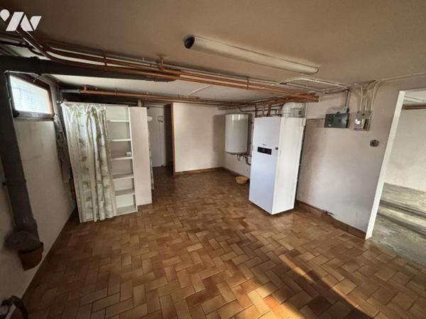 Maison 3 pièces (environ 60 m² habitables) située dans un secteur calme