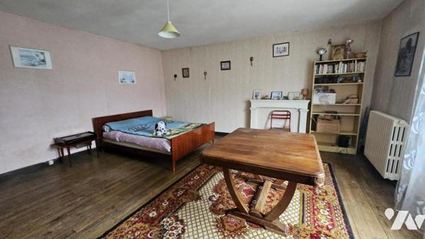 A vendre à VIVONNE, Une maison d'habitation de 135m² avec jardins et dépendances 