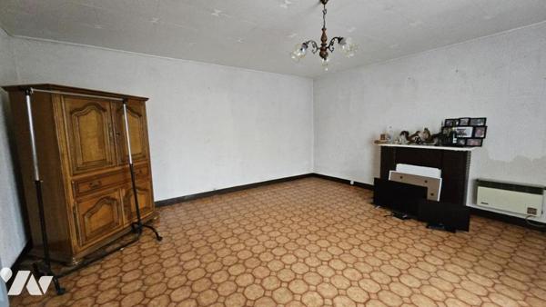 A vendre à VIVONNE, Une maison d'habitation de 135m² avec jardins et dépendances 