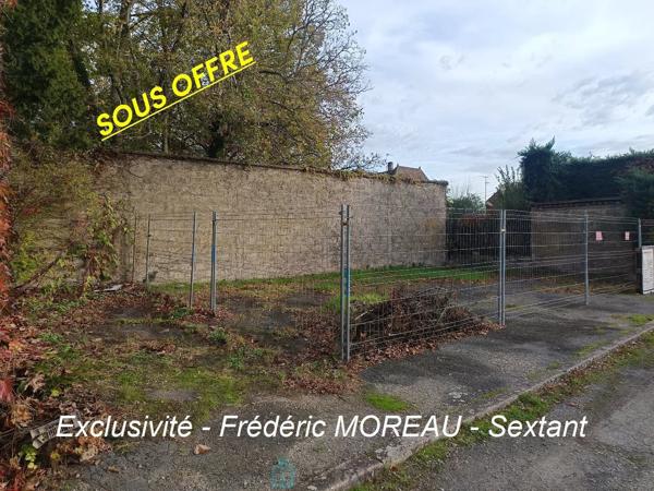 Terrain en hyper centre avec P.C accordé pour construire 3 garages de plus de 25m2 chacun