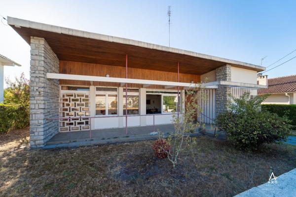 Maison d'architecte de plain pied avec garage
