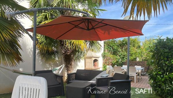 Un havre de paix aux allures de "maison de vacances" : piscine, jardin paysager et atmosphère zen