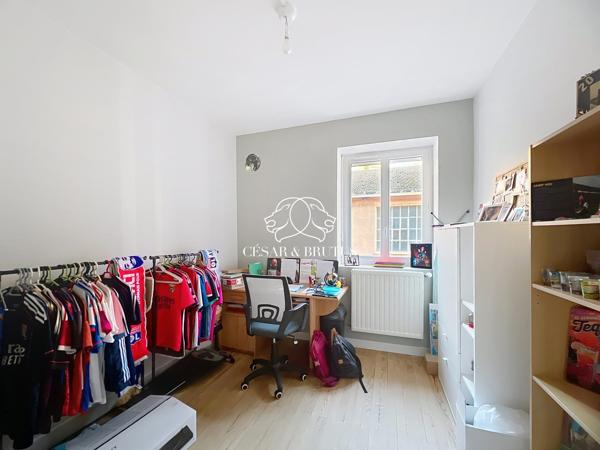 Ensemble de 3 appartements en copropriété dans un immeuble à Thizy