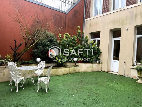 Grande maison en coeur de ville avec garage et patio