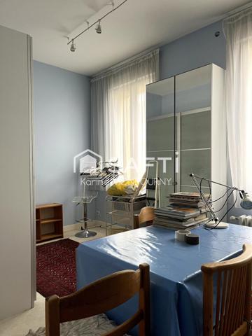 Grande maison en coeur de ville avec garage et patio