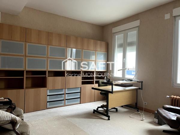 Grande maison en coeur de ville avec garage et patio