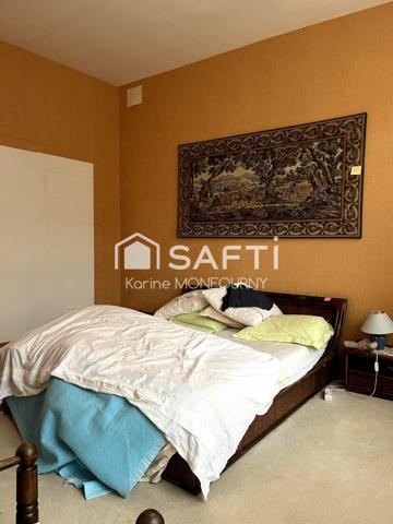 Grande maison en coeur de ville avec garage et patio