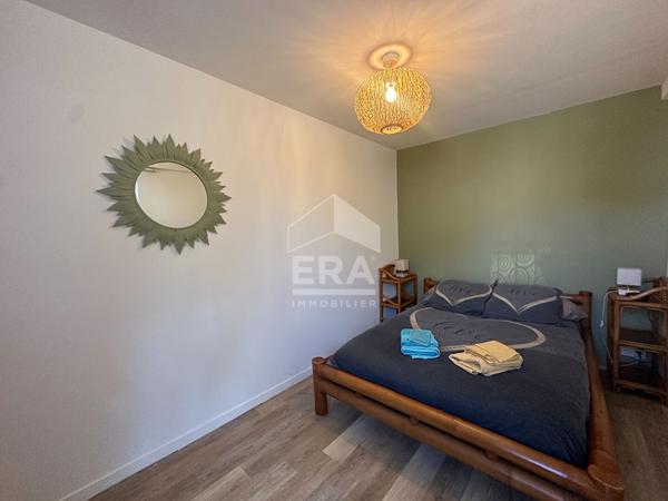 Exclusivité : Ensemble immobilier de 2 appartements avec garage à Saint-Jean