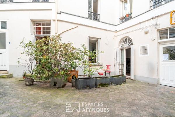 Rez-de-chaussée comme une maison sur cour