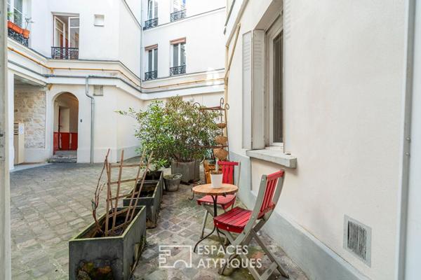 Rez-de-chaussée comme une maison sur cour