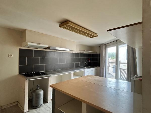 Immeuble avec local commercial et logement