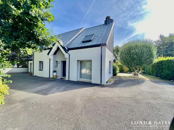 Maison familiale avec 4 chambres et garage