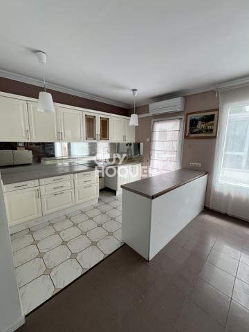 Maison de 125 m² avec véranda et jardin