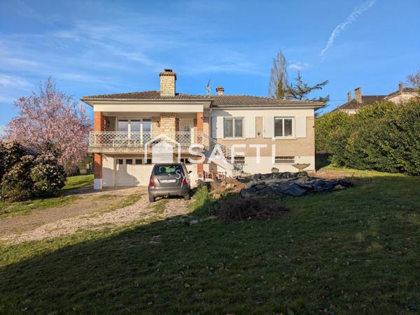 Maison avec jardin, garage et sous sol complet