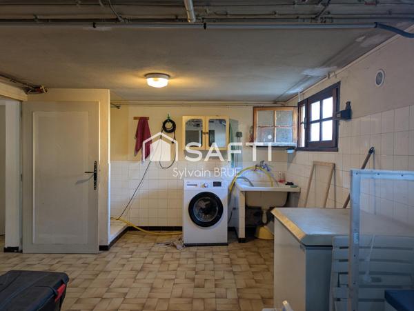 Maison avec jardin, garage et sous sol complet