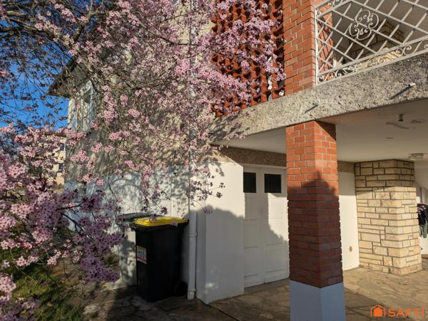 Maison avec jardin, garage et sous sol complet