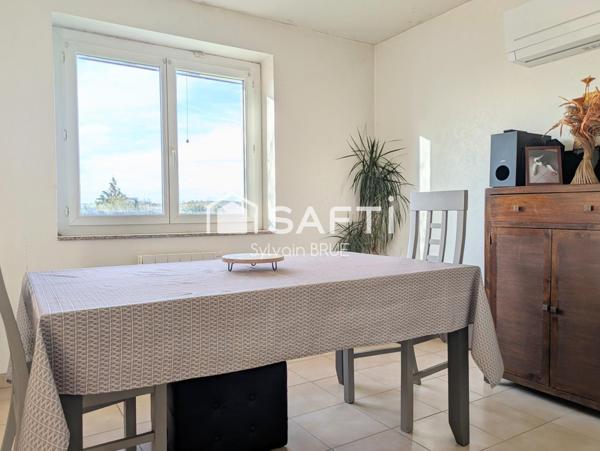 Maison avec jardin, garage et sous sol complet