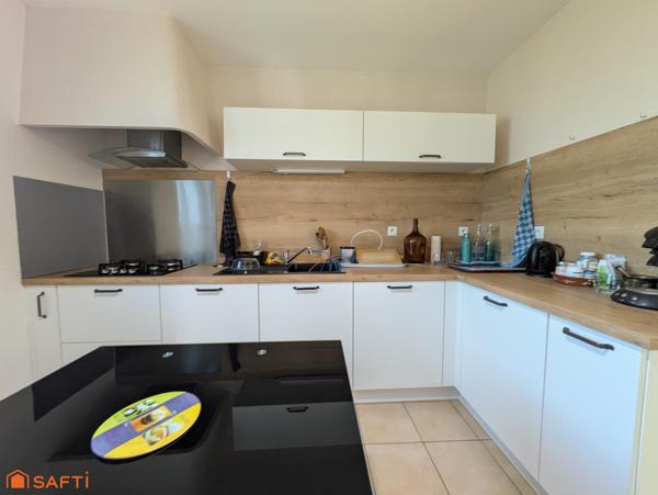 Maison avec jardin, garage et sous sol complet