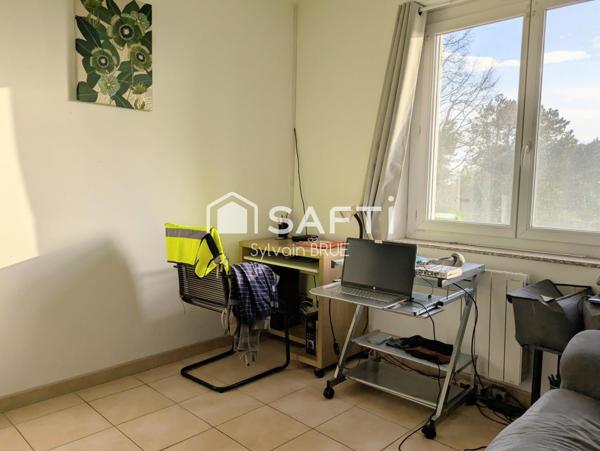 Maison avec jardin, garage et sous sol complet