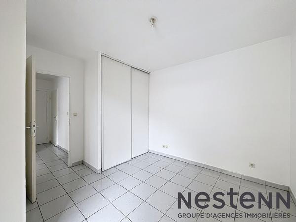 Appartement T2 avec balcon et 2 places de parking à Muret - vendu libre de tout occupant