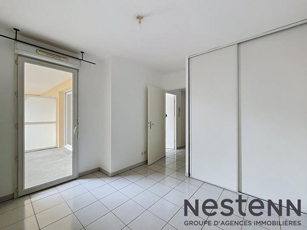 Appartement T2 avec balcon et 2 places de parking à Muret - vendu libre de tout occupant