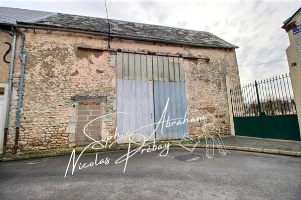 Ensemble immobilier composé d'une habitation et des dépendances