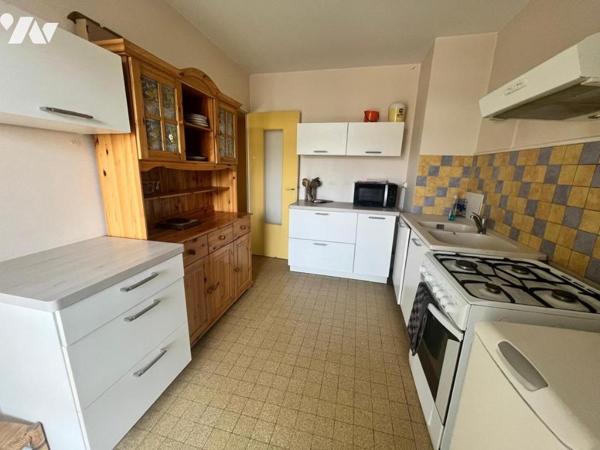 Appartement T3 avec balcon et et cave