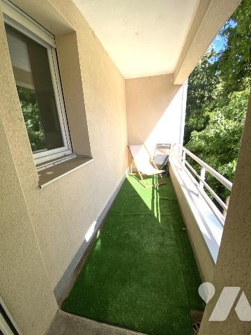 Appartement F1 avec balcon et place de parking