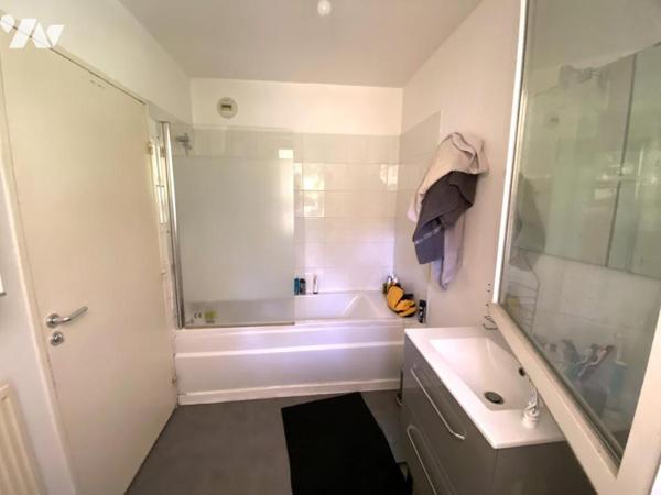 Appartement F1 avec balcon et place de parking