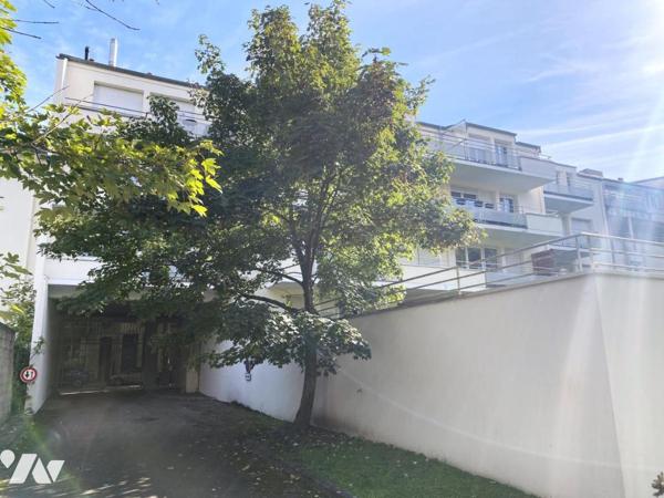 Appartement F1 avec balcon et place de parking