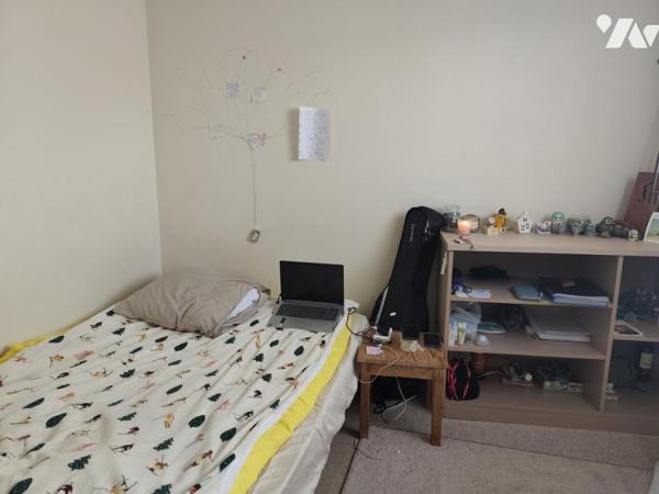 Ensemble immobilier composé de trois logements, garage et local technique