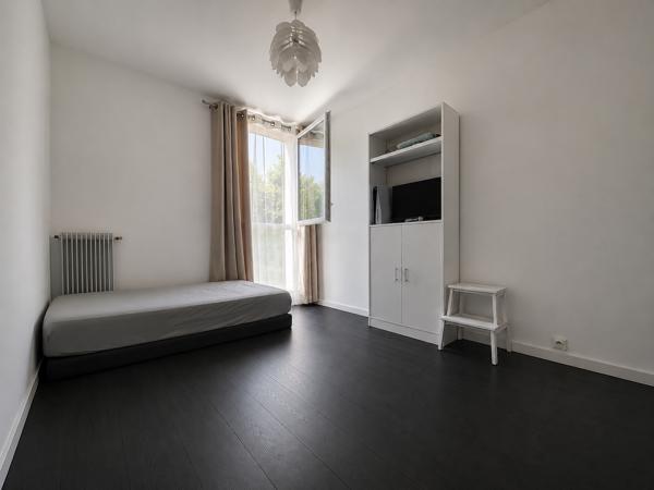 APPARTEMENT 4 PIECES AVEC BALCON VUE SUR JARDIN