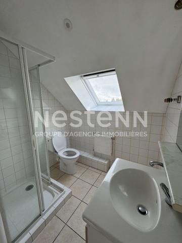 Immeuble a vendre a Plumeliau - 1 local commercial et 1 appartement de 3 chambres.