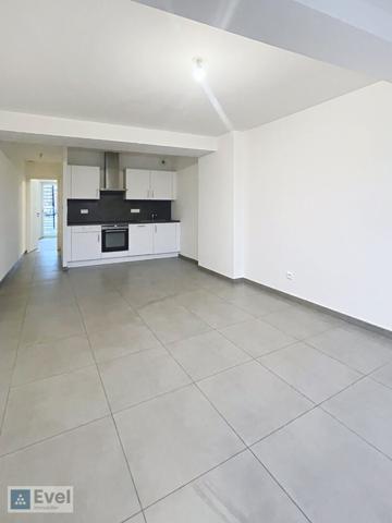 LOCATION ROUSSY LE VILLAGE - APPARTEMENT F2 PARKING ET TERRASSE