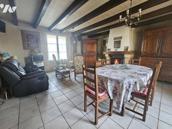 Maison trois chambres - grande dépendance et garage