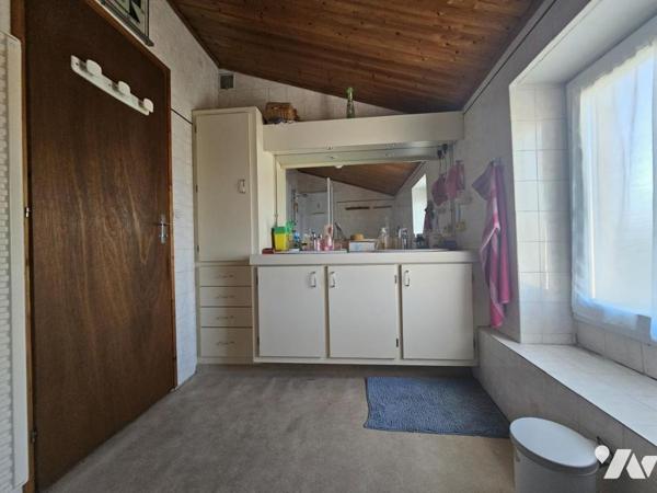 Maison trois chambres - grande dépendance et garage