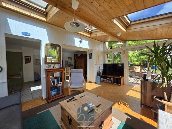 Maison 6 pièces avec garage, terrasses et jardin paysager